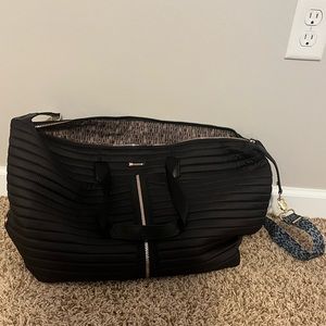 Stella & Dot Crush It Carry-on in black. Only used twice. Perfect condition.